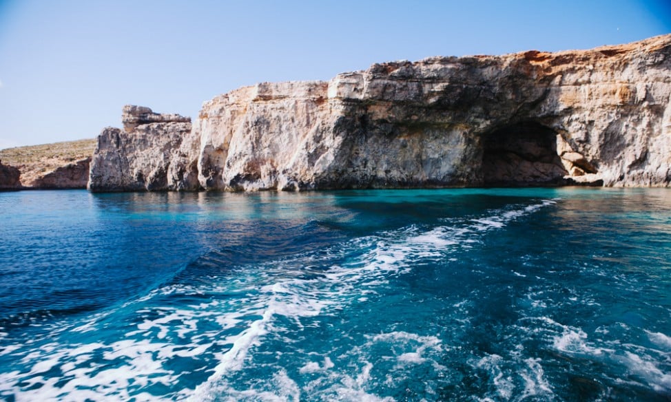 Comino cave from boat in malta